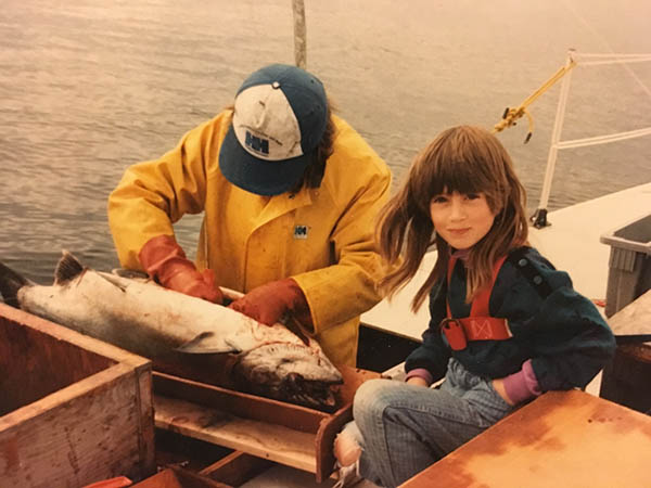young tele aadsen on boat with big fish